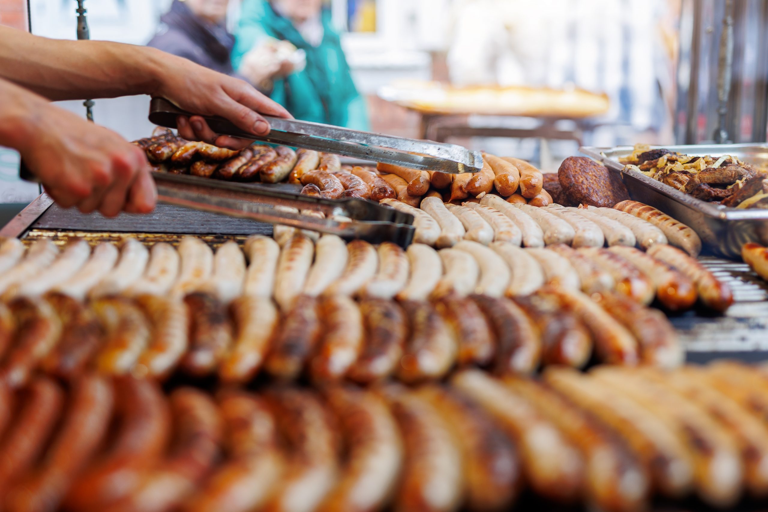 Close-up,Of,Assortment,Juicy,Bratwurst,Sausages,And,Meat,Steaks,Cooking